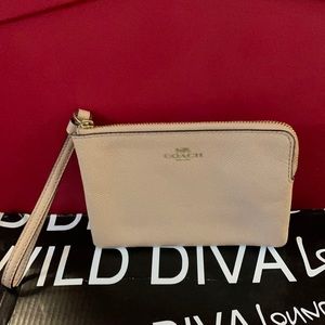 Pink COACH wristlet